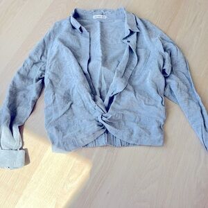 Button blouse with knot at the bottom